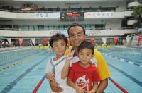 Mr. Wu and his two young sons